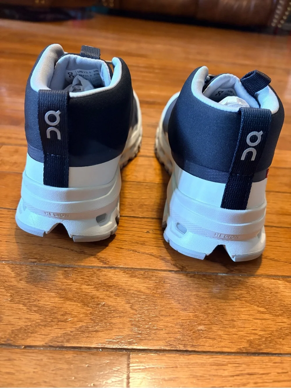 On Running Kids Boots Cloudhero mid waterproof in black and white